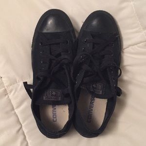 All black converse.